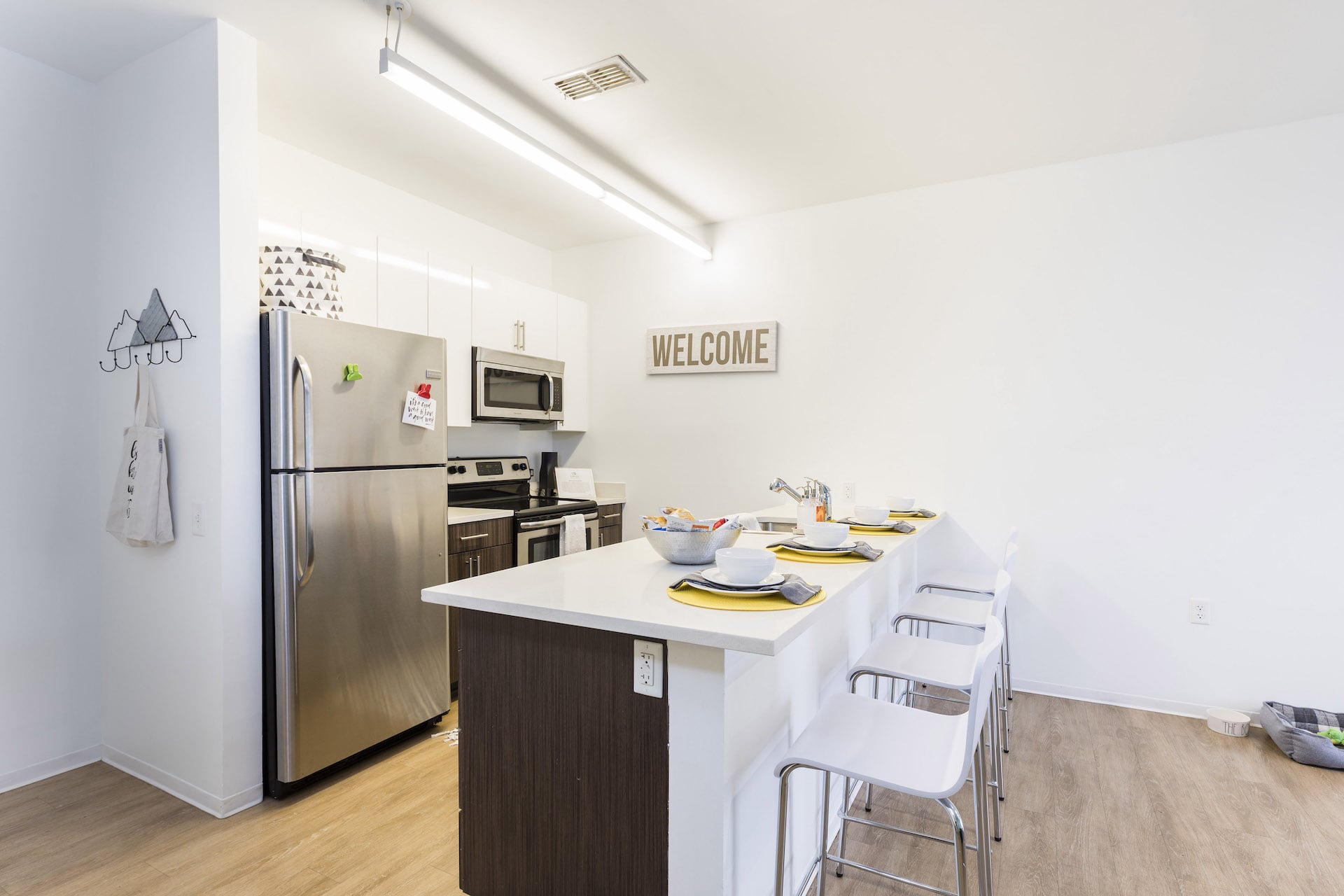 kitchen with stainless steal appliances at slate at 901 apartments