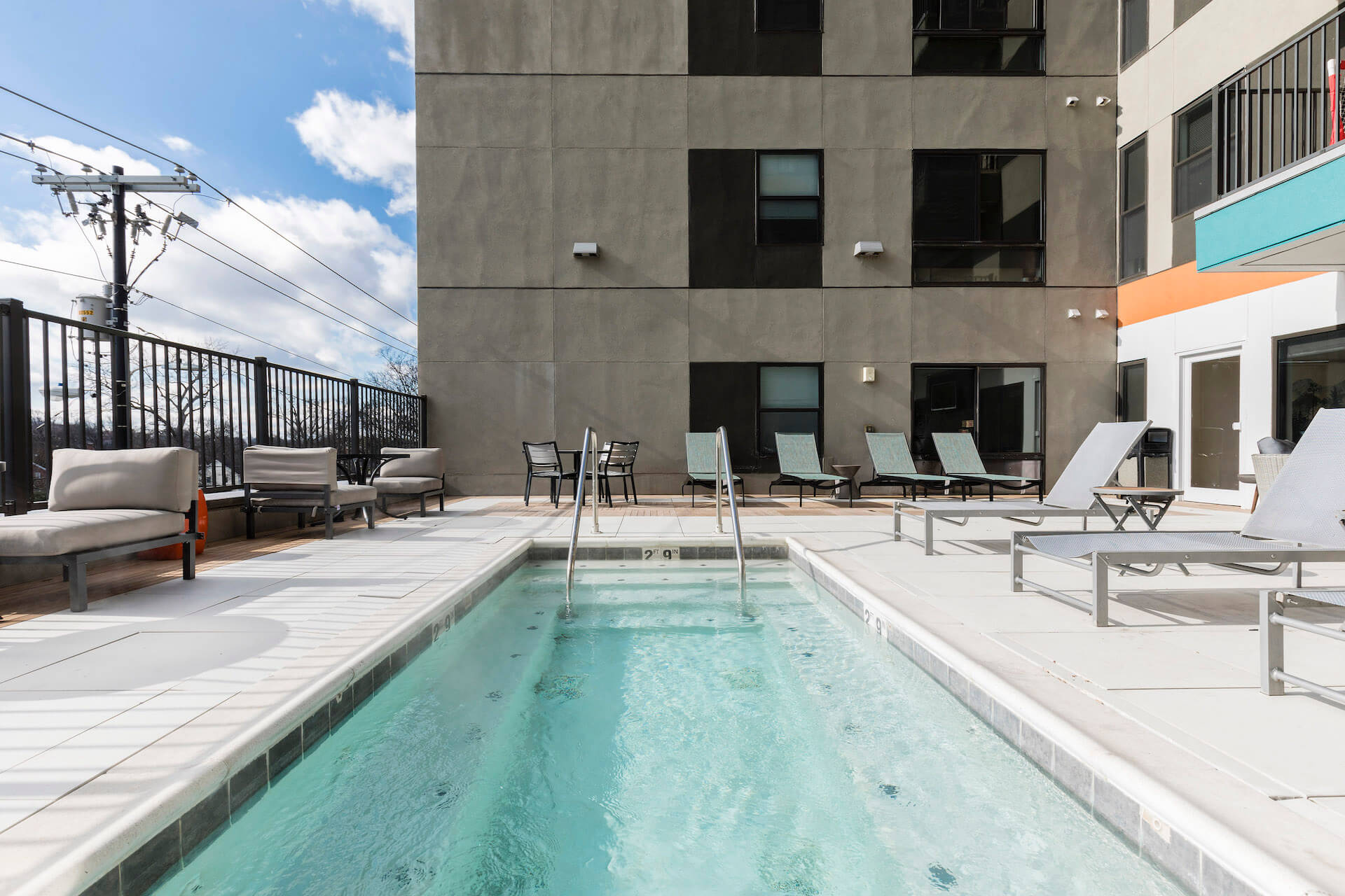 outdoor pool area at slate at 901 apartments