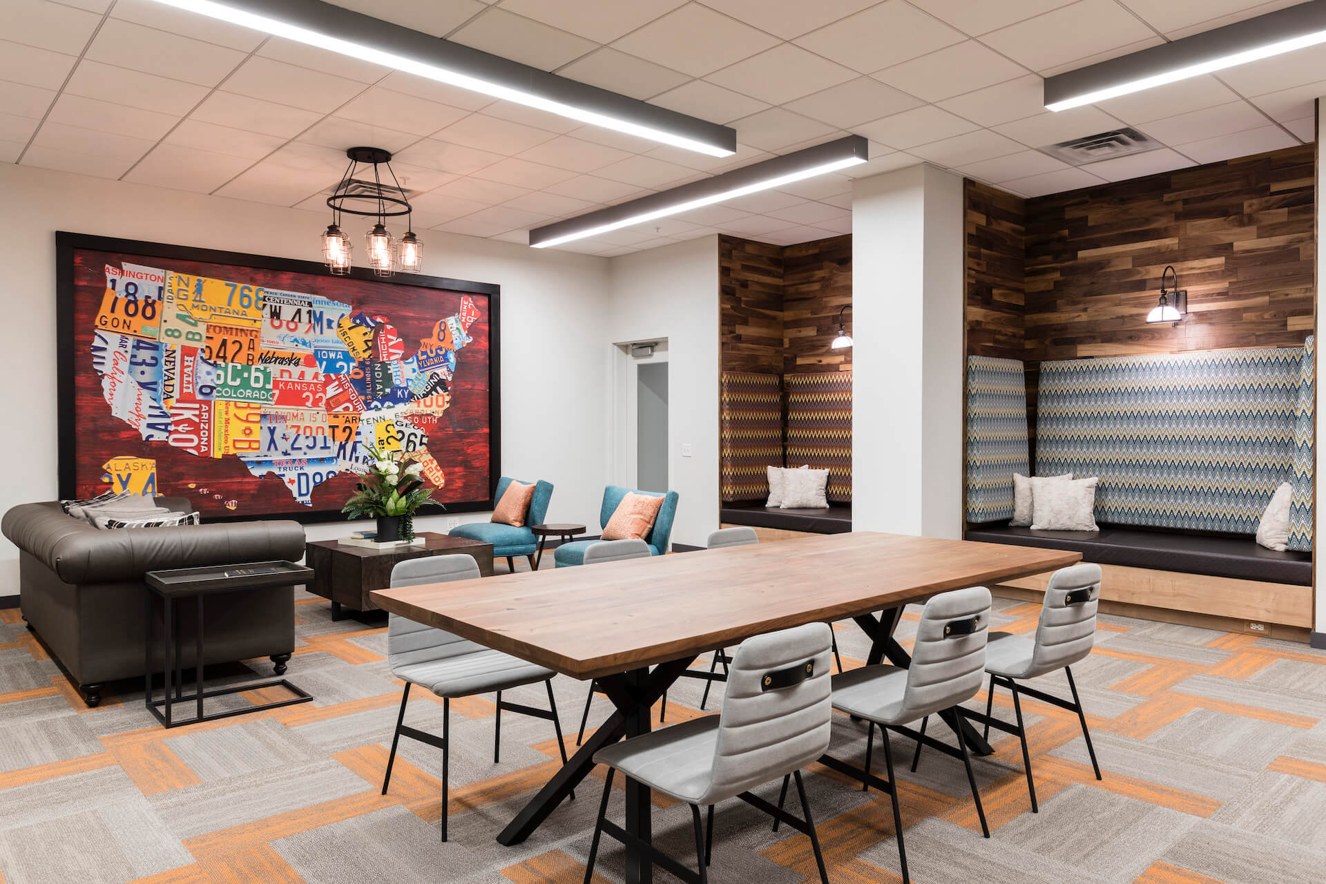 study room with tables and chairs at slate at 901 apartments